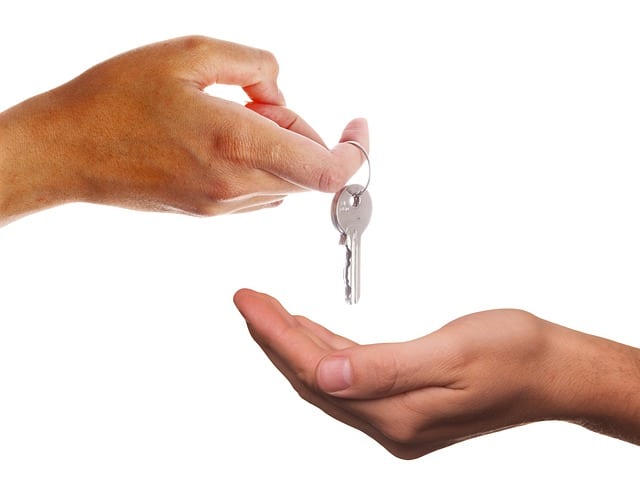 Minnesota real estate agent handing over keys